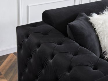 Single black velvet sofa